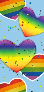 Rainbow hearts on light blue wallpaper background.