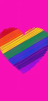 Vibrant rainbow heart on a bright pink background.