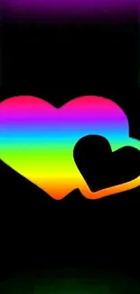 Vibrant rainbow heart wallpaper with black background and colorful gradient hearts.