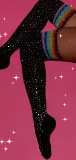 Rainbow-striped leggings on pink backdrop with sparkling stars.