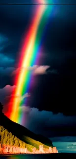 Vivid rainbow stretching across a dramatic dark sky over scenic landscape.