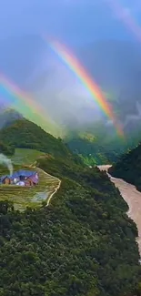 Lush green hills with a rainbow arching.