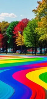 Vibrant rainbow pathway in a colorful forest setting.