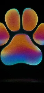 Colorful rainbow paw print on dark background.