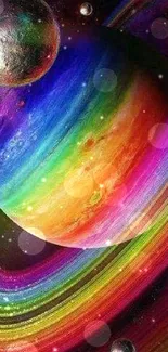 Vibrant rainbow planet with cosmic rings wallpaper.