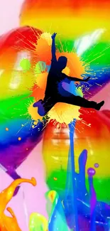 Vibrant rainbow wallpaper with paint splash and silhouette.