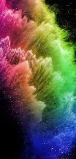 Abstract vibrant rainbow splash against black background.