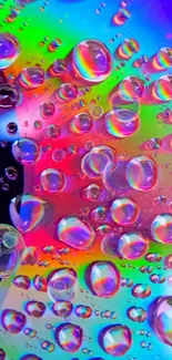 Vibrant rainbow water droplets on a mobile wallpaper.