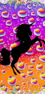 Colorful mobile wallpaper with unicorn silhouette and raindrops.