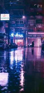 Rainy city street with vivid neon reflections at night.