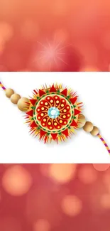 Vibrant Raksha Bandhan rakhi with red bokeh background.