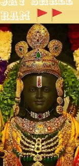 Adorned idol of Lord Ram surrounded by colorful flowers.