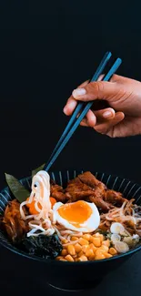 Ramen bowl with chopsticks in vivid colors.