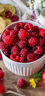 Vibrant raspberry bowl with flowers and cookies.