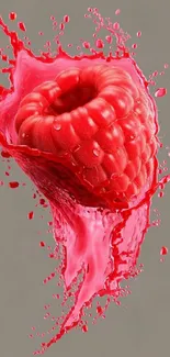 Raspberry splash art with a vibrant, dynamic juice effect.