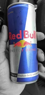 Vibrant and dynamic Red Bull can wallpaper with bold colors.