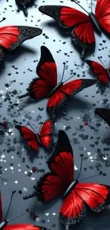 Mobile wallpaper with red butterflies on a gray background.
