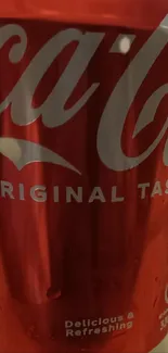 Coca-Cola can with iconic red color and logo.