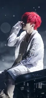 Performer with red hair on stage in white attire with a dramatic background.