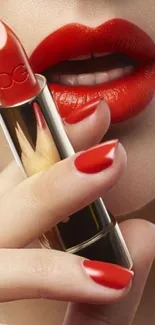 Close-up of red lipstick, lips, and nails.