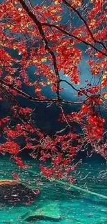 Red maple leaves over a tranquil blue lake.