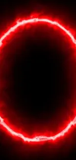 Red neon circle glowing on a dark background