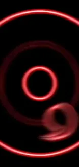 Neon red circles on a black background wallpaper.