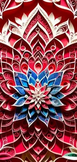 Intricate red paper art design with a vibrant, floral-inspired pattern.