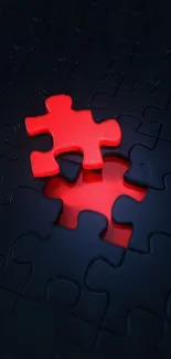 Red puzzle piece on a black background.