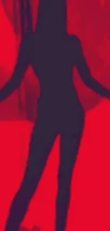 Silhouette in vibrant red artistic style.