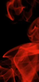 Abstract red smoke on black background wallpaper.