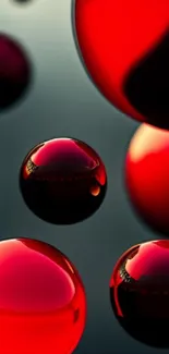 Glossy red spheres floating on a black background.