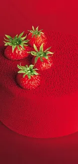 Red cake topped with fresh strawberries on vibrant background.