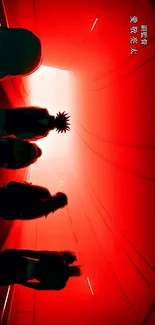 Silhouetted figures in a glowing red tunnel, creating a dramatic scene.