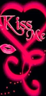 Romantic pink and black wallpaper with glowing heart and 'Kiss Me' text.