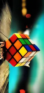 Vibrant Rubik's Cube on teal wood.