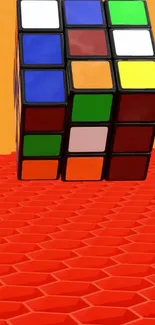 Colorful Rubik's Cube on orange background.