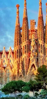 Sagrada Familia in Barcelona with a vibrant rainbow and clear sky.