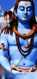 Serene image of Lord Shiva meditating with blue tones.