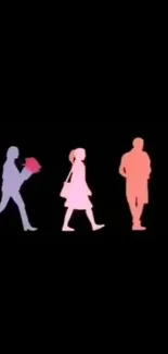 Silhouettes of three colored figures on black background.