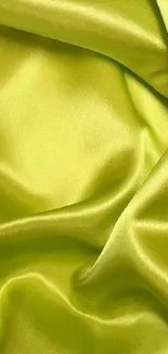 Lime green silk texture with smooth folds.