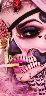 Intricate skull makeup with pink hues and ladybugs on a woman's face.