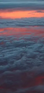 Vibrant orange and blue clouds at sunset, ideal for a mobile wallpaper.