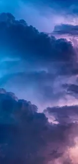 Vibrant purple and blue cloudy sky wallpaper for mobile devices.