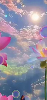 Lotus flowers bloom under a colorful sky with a glowing sun.