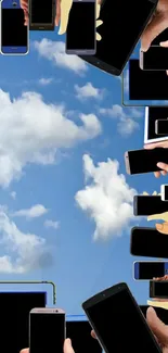 Hands holding smartphones against a vibrant sky background.