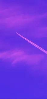 Jet trail across a vibrant purple sky wallpaper.