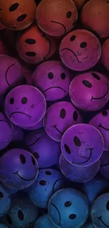 Colorful smiley faces wallpaper with a purple gradient effect.