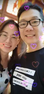 Smiling couple with vibrant background and warm lighting.