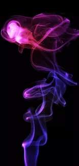 Vibrant purple and pink smoke on black background wallpaper.